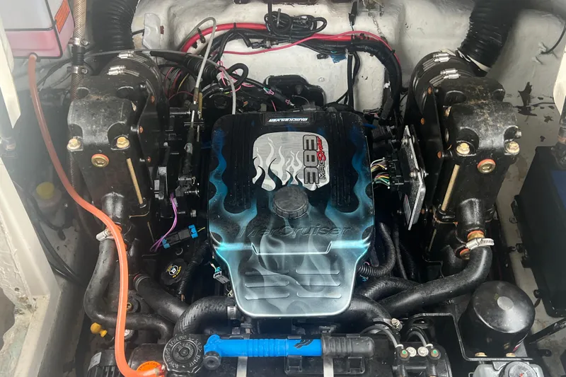 Slide: The Image of Engine of a 2005 Sea Ray 270 Sundeck boat, featuring MerCruiser 383 Mag. - 33