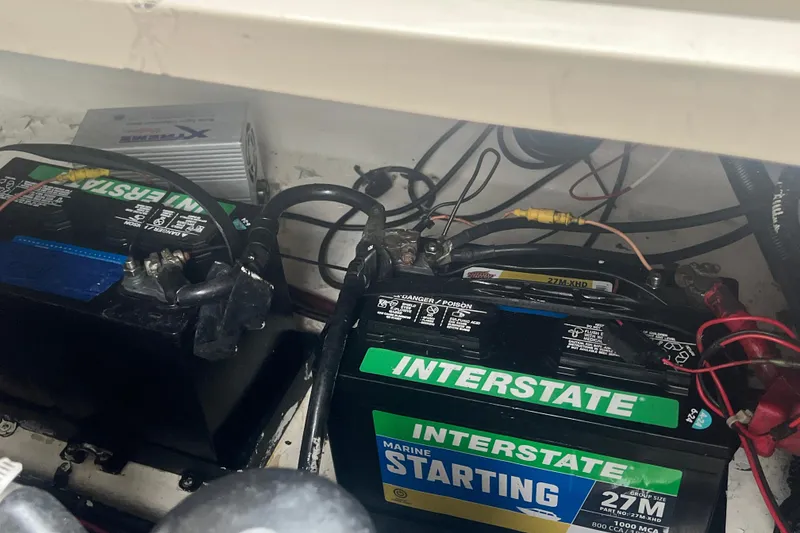 Slide: The Image of Marine batteries in a 2005 Sea Ray 270 Sundeck boat engine compartment. - 34