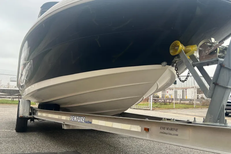 Slide: The Image of 2005 Sea Ray 270 Sundeck boat on trailer, side view. - 37