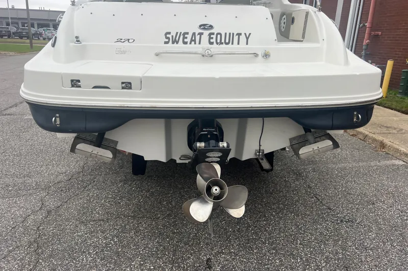 Slide: The Image of Rear view of 2005 Sea Ray 270 Sundeck boat named "Sweat Equity." - 4