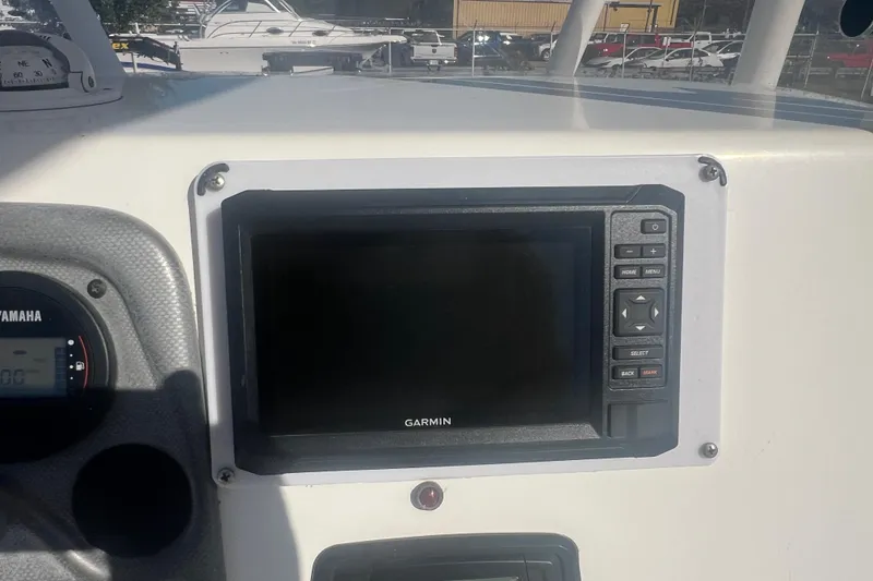 Slide: The Image of Dashboard of 2013 Tidewater 216 CC Adventure with Garmin navigation system. - 10