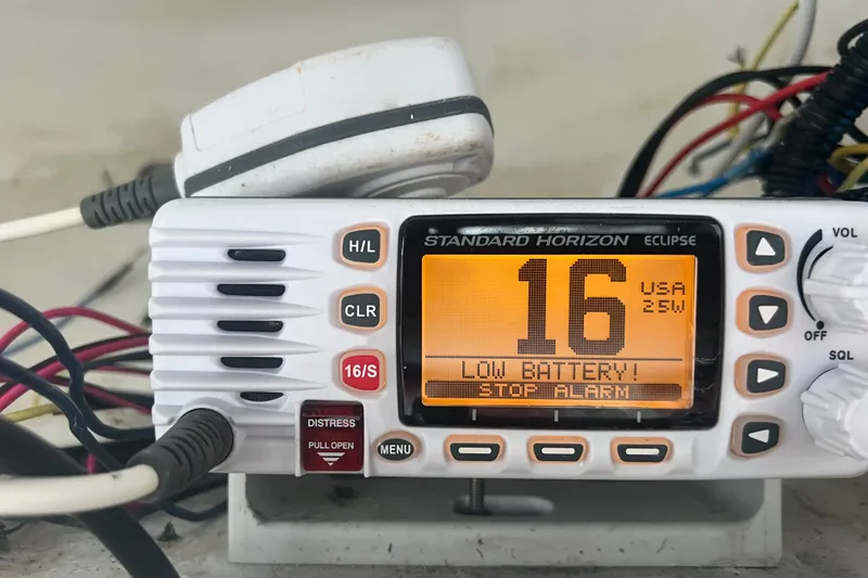 Slide: The Image of Standard Horizon Eclipse radio displaying "Low Battery" alert on Tidewater 216 CC Adventure. - 21