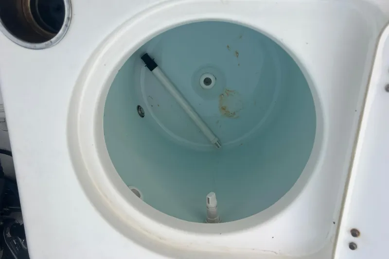 Slide: The Image of Livewell interior of 2013 Tidewater 216 CC Adventure boat. - 33