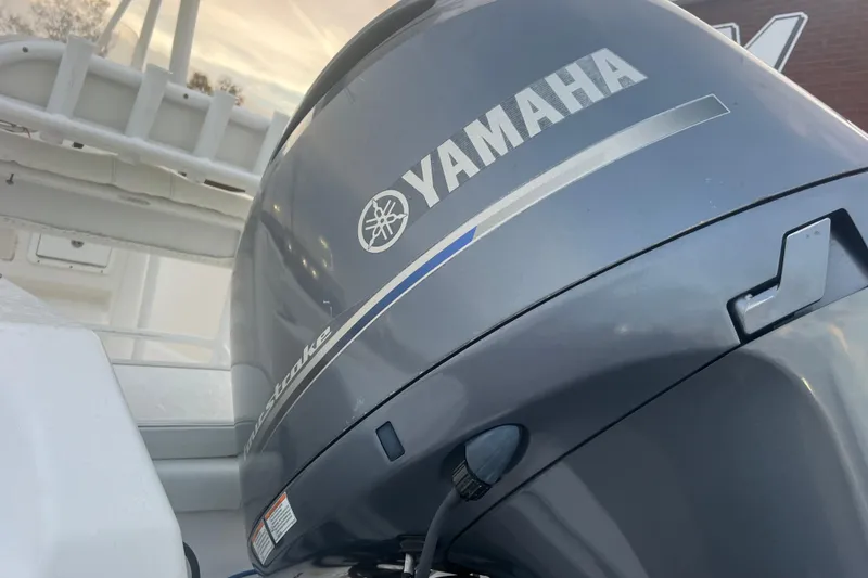 Slide: The Image of Yamaha outboard motor on 2013 Tidewater 216 CC Adventure boat, close-up view. - 40