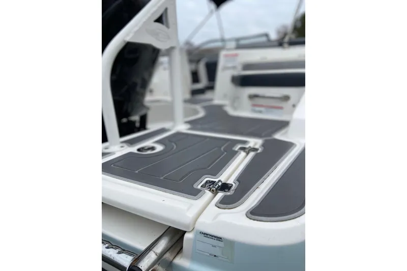 Slide: The Image of 2021 Chaparral 230 Suncoast boat deck with sleek design and modern features. - 10