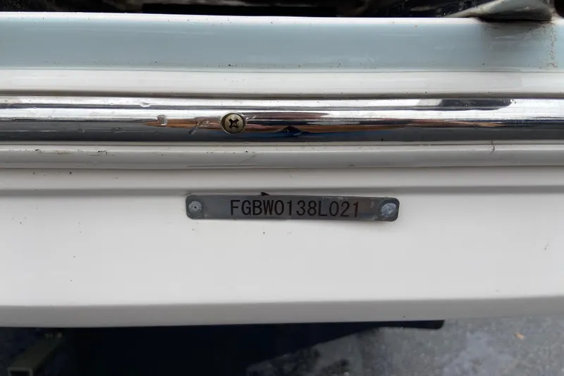 Slide: The Image of 2021 Chaparral 230 Suncoast boat with visible hull identification number. - 7