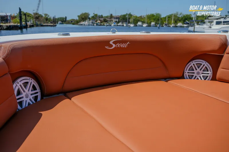 Slide: The Image of Luxurious seating on 2019 Scout 420 LXF boat with waterfront view. - 61