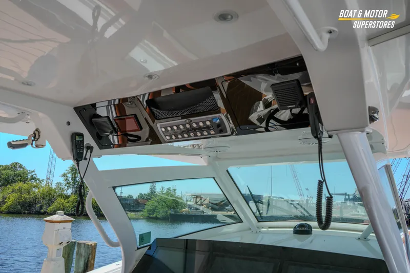 Slide: The Image of 2019 Scout 420 LXF boat interior with advanced navigation equipment and controls. - 71
