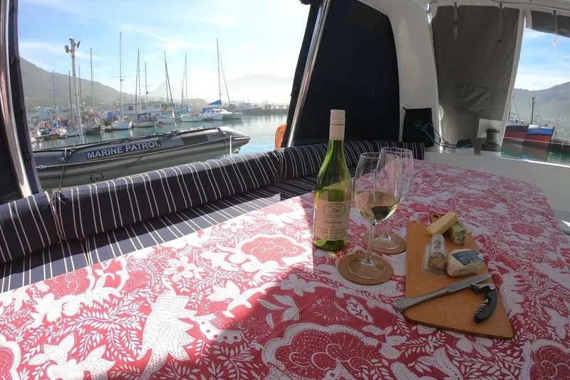 Slide: The Image of Maxim Yachts 57, 2006, with wine and cheese on deck, marina view. - 11