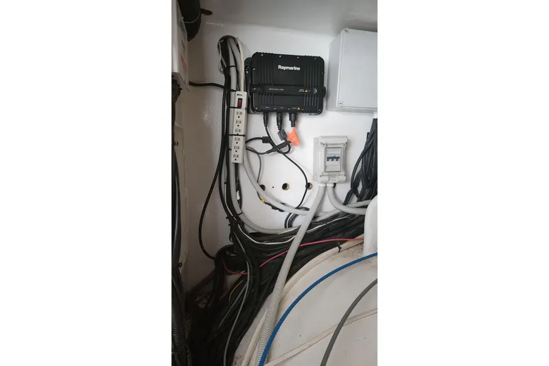 Slide: The Image of Electrical wiring and equipment inside a 2006 Maxim Yachts 57 boat. - 40