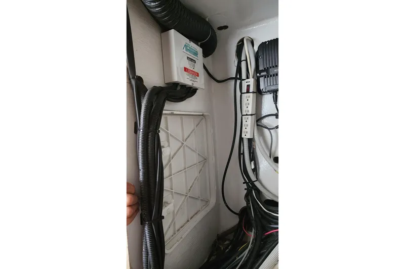 Slide: The Image of Electrical wiring and components inside a 2006 Maxim Yachts 57. - 42