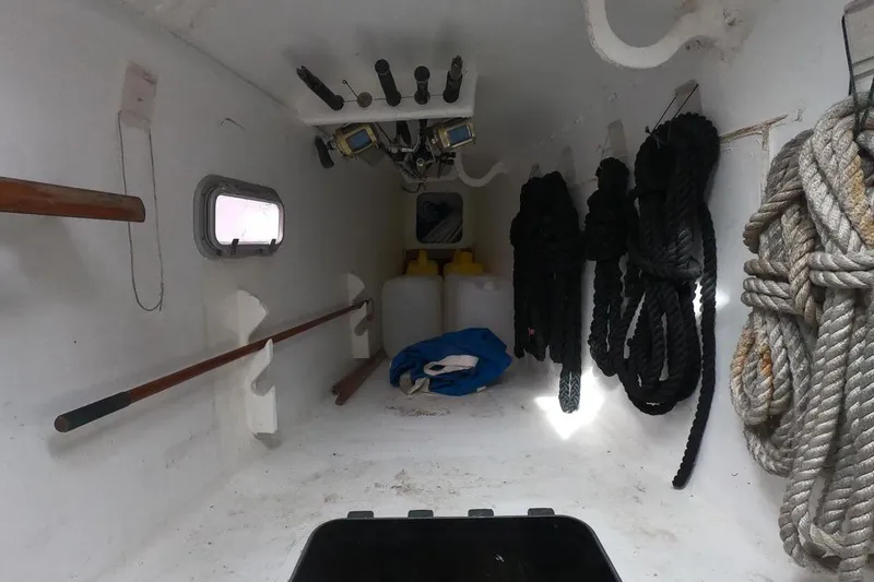 Slide: The Image of Interior of 2006 Maxim Yachts 57, featuring ropes and equipment storage. - 20