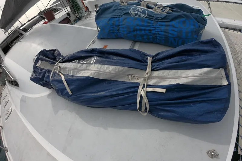 Slide: The Image of Deck of 2006 Maxim Yachts 57 with blue sail bags. - 22