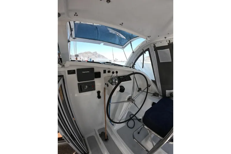 Slide: The Image of Cockpit of 2006 Maxim Yachts 57 with steering wheel and navigation equipment. - 8