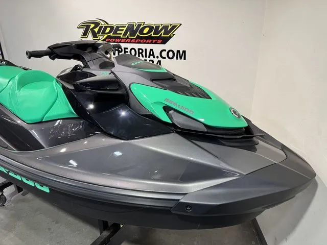Slide: The Image of 2026 Sea-Doo GTI SE 170 jet ski in black and green. - 19