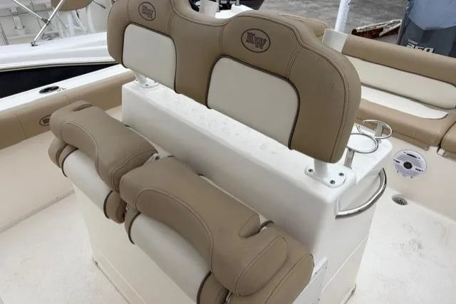 Slide: The Image of 2018 Key West 239 FS boat seating with tan and white upholstery. - 16