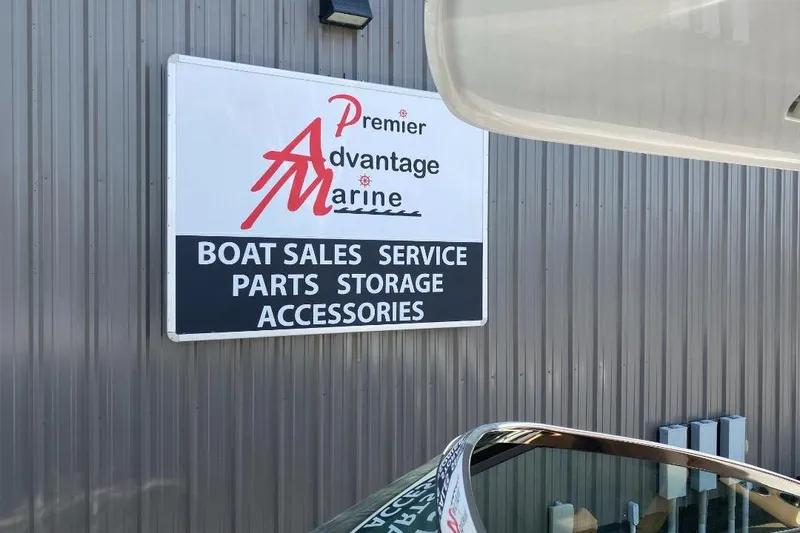 Slide: The Image of Sign for Premier Advantage Marine offering boat sales, service, parts, storage, and accessories. - 26