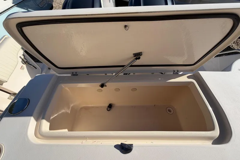 Slide: The Image of Open storage compartment on 2009 Grady-White Tournament 307 boat. - 10