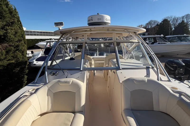 Slide: The Image of 2009 Grady-White Tournament 307 boat with spacious seating and modern navigation equipment. - 31