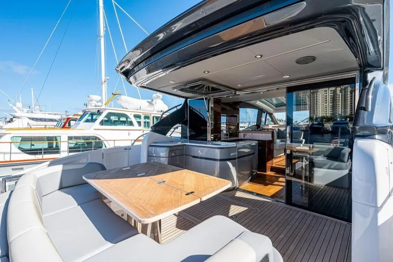 Slide: The Image of Luxurious 2019 Princess V60 yacht with spacious deck and modern interior design. - 7