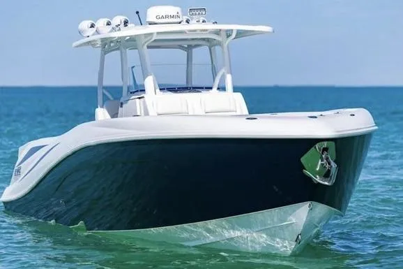 The Image of 2012 Deep Impact 399 Sport boat on clear blue water. - 1