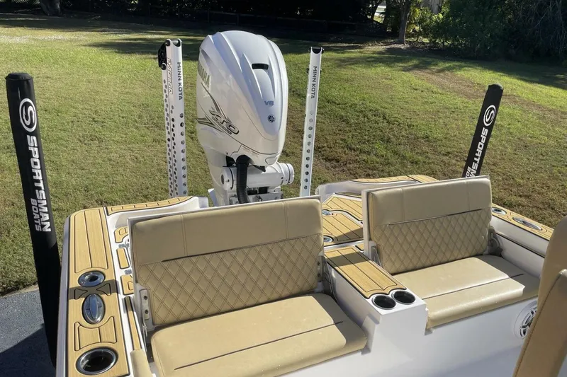 Slide: The Image of 2023 Sportsman Masters 267 Bay Boat with Yamaha engine and cushioned seating. - 9