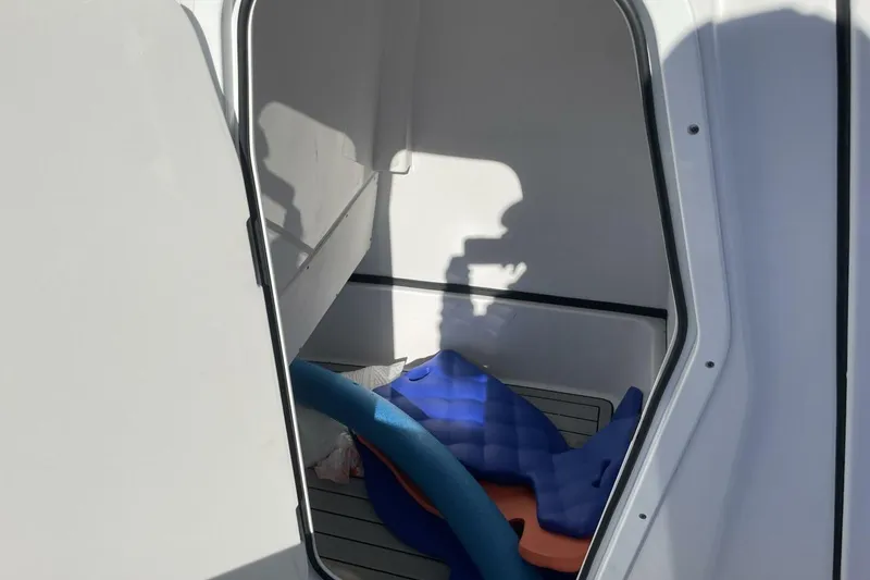 Slide: The Image of Interior view of 2023 Sportsman Masters 267 Bay Boat storage compartment. - 23
