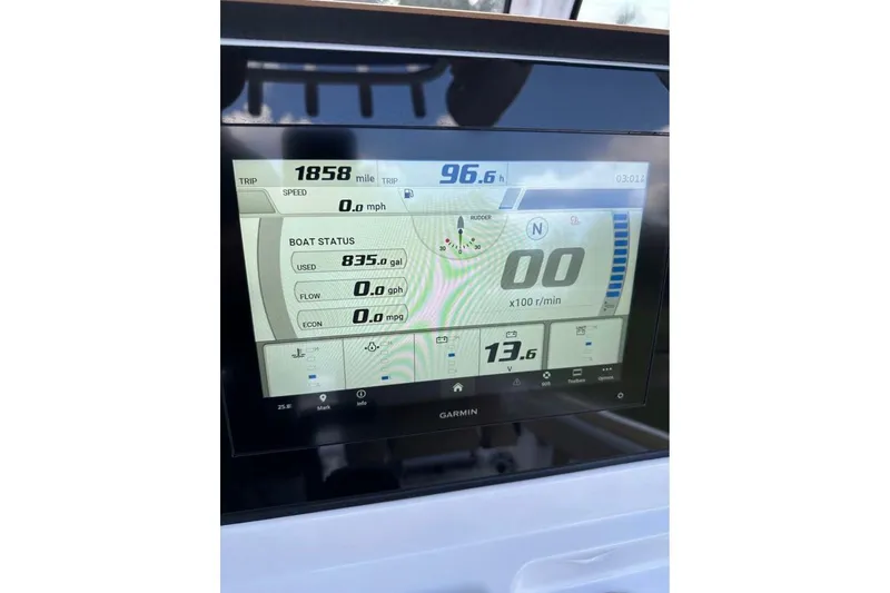 Slide: The Image of Dashboard display of 2023 Sportsman Masters 267 Bay Boat showing trip and boat status. - 13
