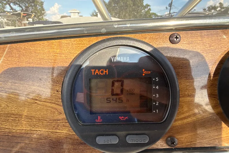 Slide: The Image of Yamaha tachometer on 2008 Scout 205 Sportfish boat dashboard, showing 545 hours. - 19