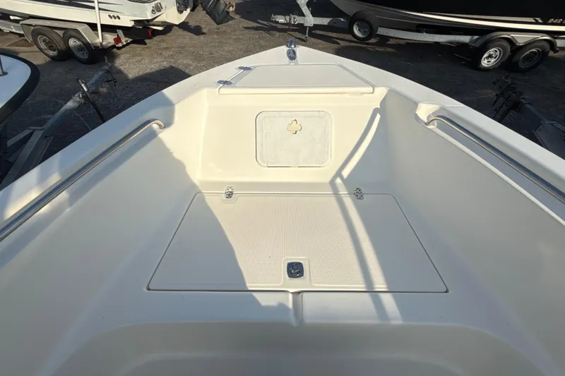 Slide: The Image of 2008 Scout 205 Sportfish boat deck with storage compartment, viewed from above. - 28