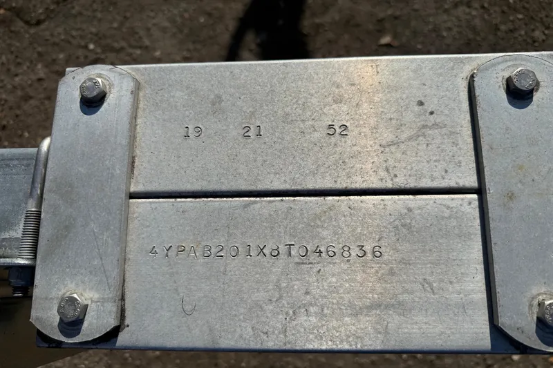 Slide: The Image of Close-up of metal plate with serial number on 2008 Scout 205 Sportfish. - 34