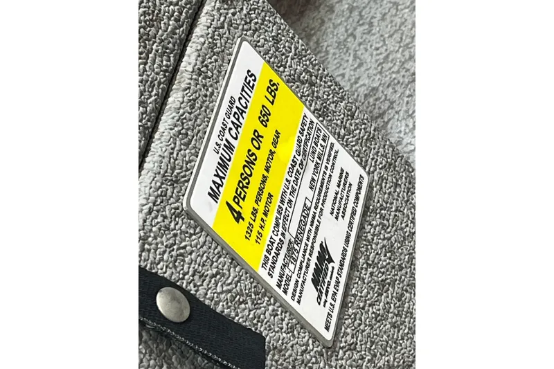 Slide: The Image of 2021 Lund 1875 Renegade boat capacity label, maximum 4 persons or 650 lbs. - 11