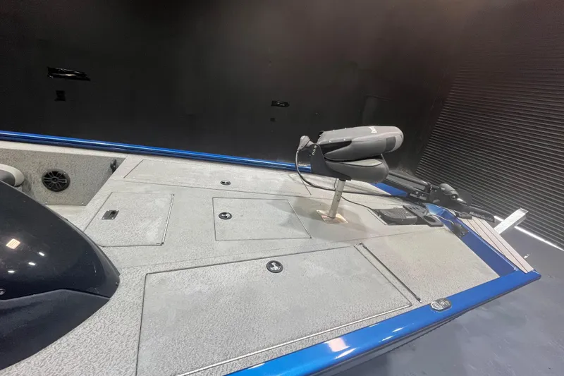 Slide: The Image of 2021 Lund 1875 Renegade boat deck with seating and storage compartments. - 8