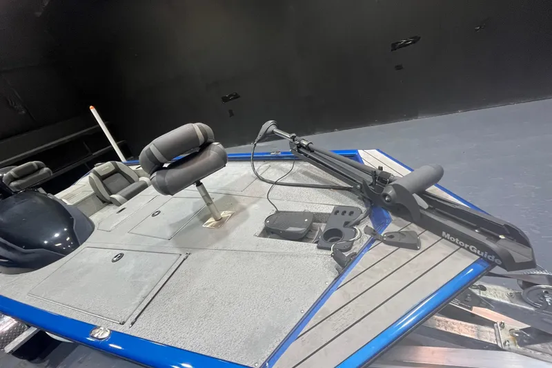 Slide: The Image of 2021 Lund 1875 Renegade boat interior with MotorGuide trolling motor and seating. - 9