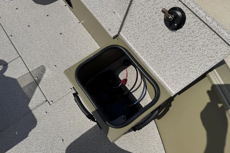 Slide: The Image of Open storage compartment on 2025 Lund 1875 Alaskan SS boat deck. - 13