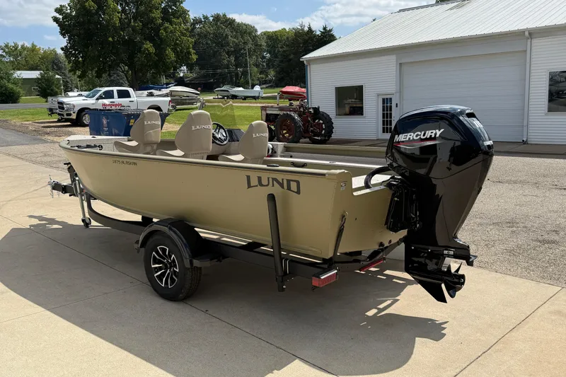 Slide: The Image of 2025 Lund 1875 Alaskan SS boat with Mercury outboard motor on trailer. - 6