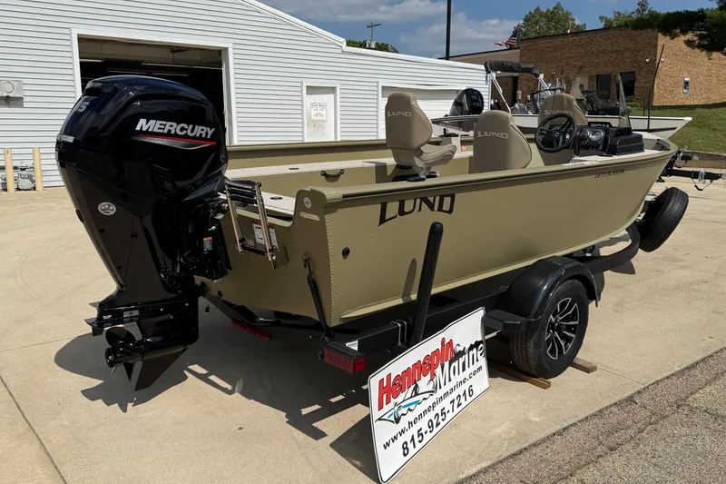 Slide: The Image of 2025 Lund 1875 Alaskan SS boat with Mercury engine on trailer at dealership. - 9