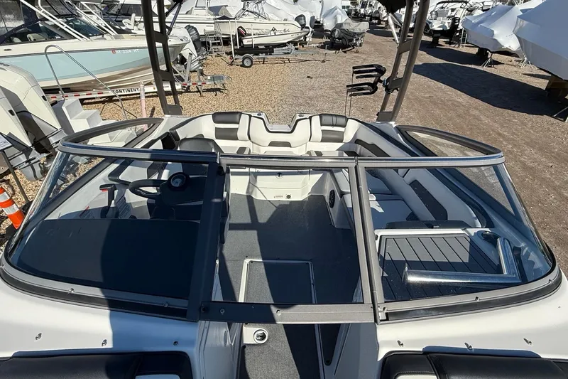 Slide: The Image of 2019 Yamaha Boats AR195 interior view at a boatyard. - 13