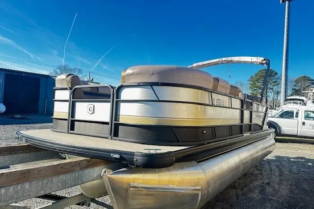 Slide: The Image of 2018 Godfrey Sweetwater 2286 SB Triple Tube pontoon boat on trailer. - 1