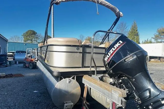 Slide: The Image of 2018 Godfrey Sweetwater 2286 SB Triple Tube pontoon with Suzuki outboard motor. - 4
