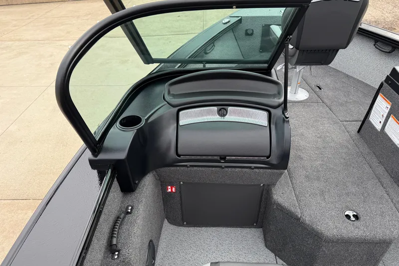 Slide: The Image of 2026 Lund 2075 Fisherman boat interior with windshield and seating area. - 20