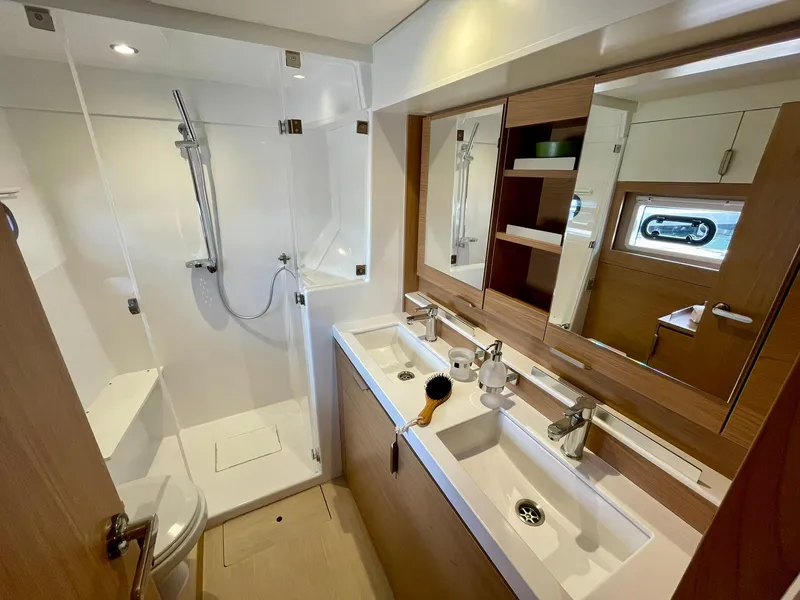 Slide: The Image of Modern bathroom in 2026 Bali 4.2 yacht with dual sinks and shower. - 18