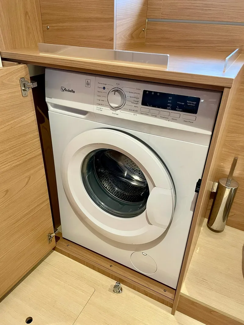 Slide: The Image of Modern Bali 4.2 washing machine in wooden cabinet, 2026 model. - 20