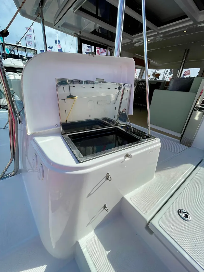 Slide: The Image of Bali 4.2 yacht interior, 2026 model, featuring a sleek storage compartment. - 37