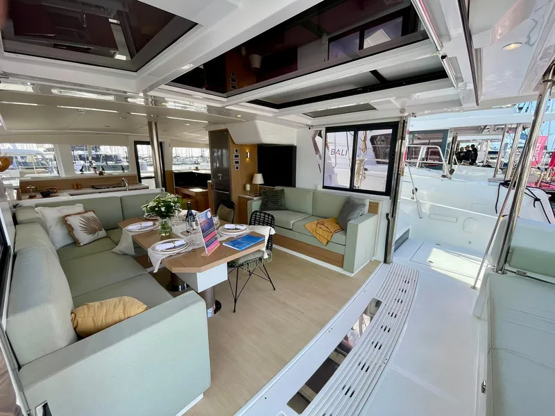Slide: The Image of Luxurious interior of 2026 Bali 4.2 catamaran with spacious seating and modern design. - 4