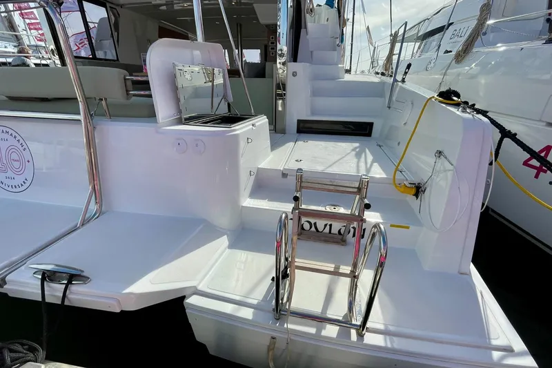 Slide: The Image of Sleek Bali 4.2 yacht deck with modern design, featuring steps and railing, 2026 model. - 40