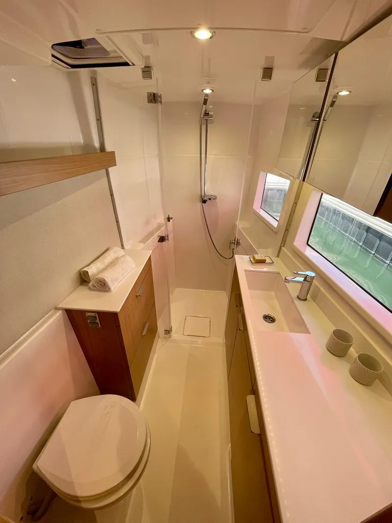 Slide: The Image of Modern bathroom in 2026 Bali CATSMART yacht with sleek fixtures and natural lighting. - 25