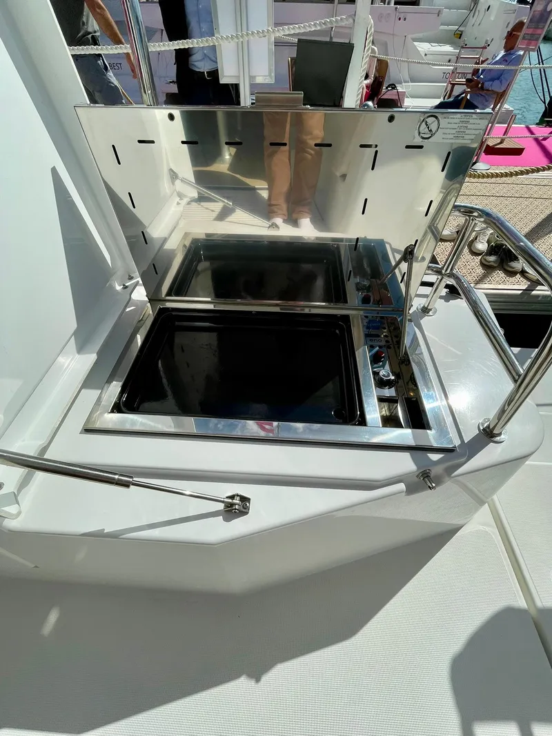 Slide: The Image of Bali CATSMART 2026 yacht hatch with stainless steel finish and railing. - 34