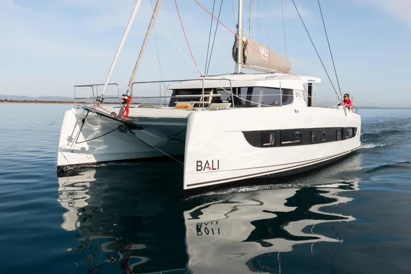 Slide: The Image of 2026 Bali CATSMART catamaran sailing on calm waters. - 5