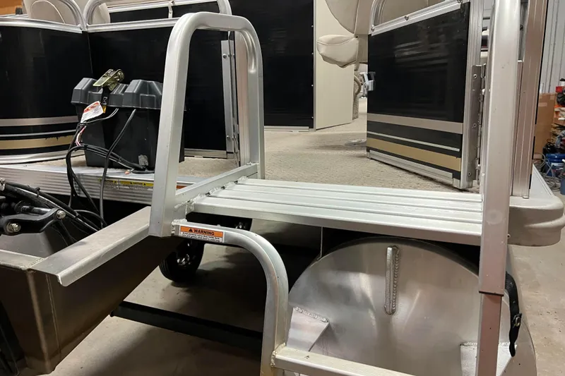 Slide: The Image of 2014 Avalon Grand Island 2485 QF pontoon boat with aluminum deck and battery compartment. - 66